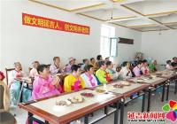 齊心協力助創城 文明志愿百花開